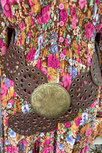 boho belt with a floral background